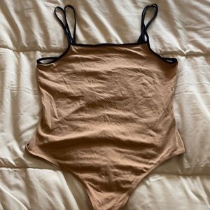 Cute strappy bodysuit, brand new!